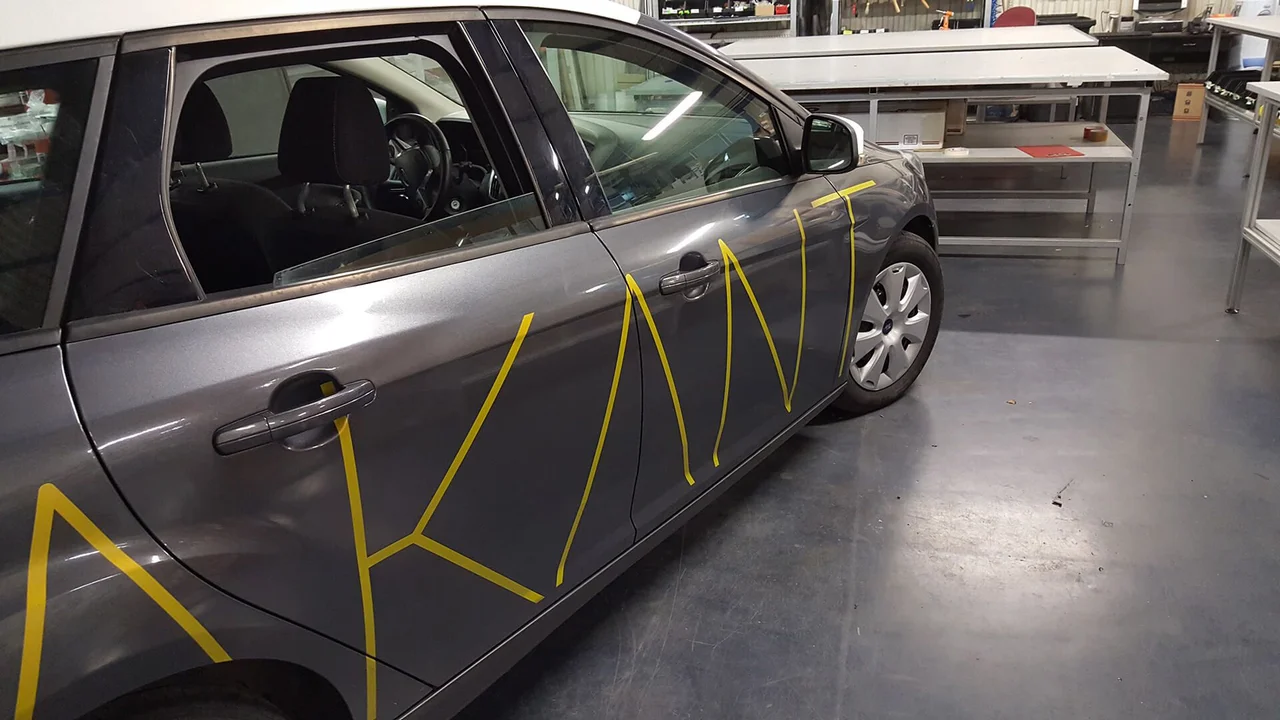 Oklejenie samochodu firmowego Akant