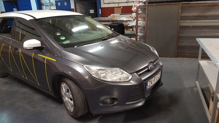 Oklejenie samochodu firmowego Akant.