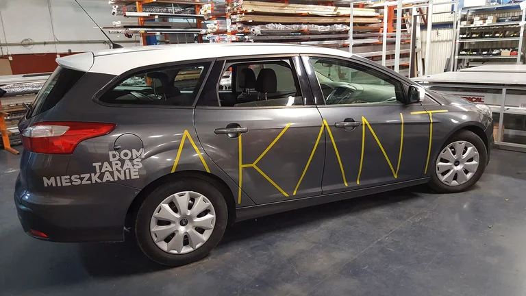 Oklejenie samochodu firmowego Akant.