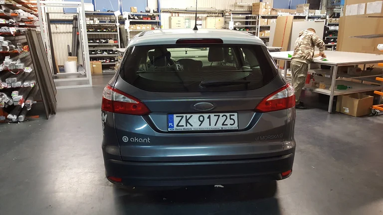 Oklejenie samochodu firmowego Akant.