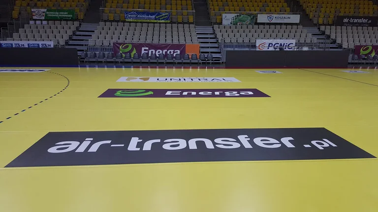 Logo na parkiecie - Air Transfer